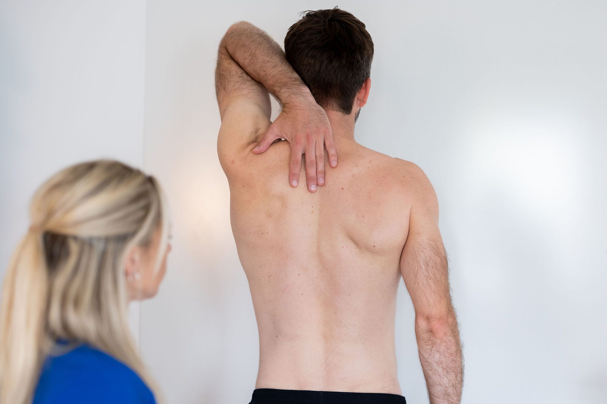 Guided shoulder mobility assessment at SPORTS CLINICAL